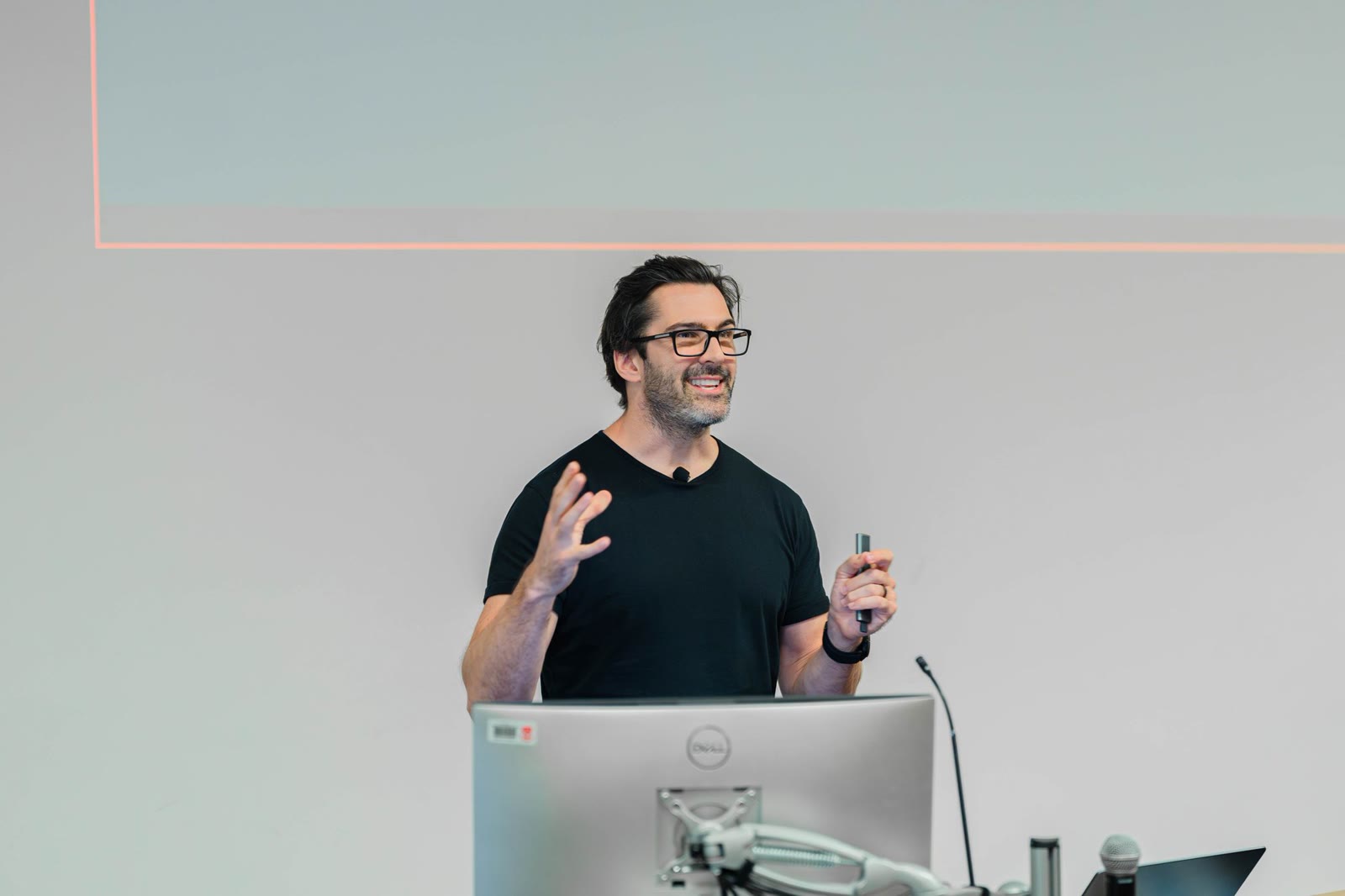 Technology speaker presenting to a live audience
